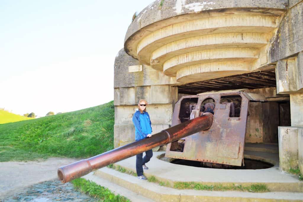 Picture of Stephanie standing in front of WWII gun bunker