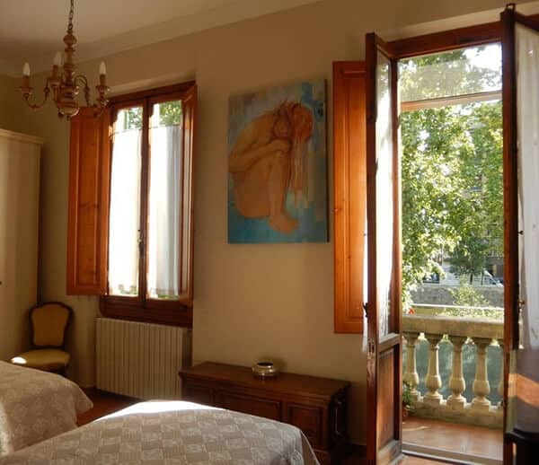 Our Airbnb in Florence, Italy had a bedroom that opened onto a small balcony