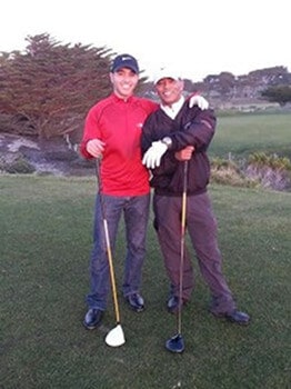 Picture of Mike golfing with his son