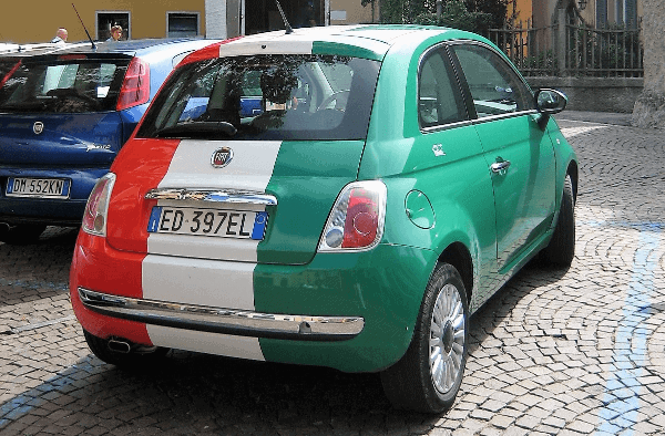 A red, white and green striped car in Italy
