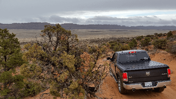 Picture of a pickup truck on a dirt road in Arches National Park