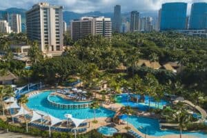 The giant pool surrounded by tropical greenery at the Hale Koa Hotel, an Armed Forces Recreation Center
