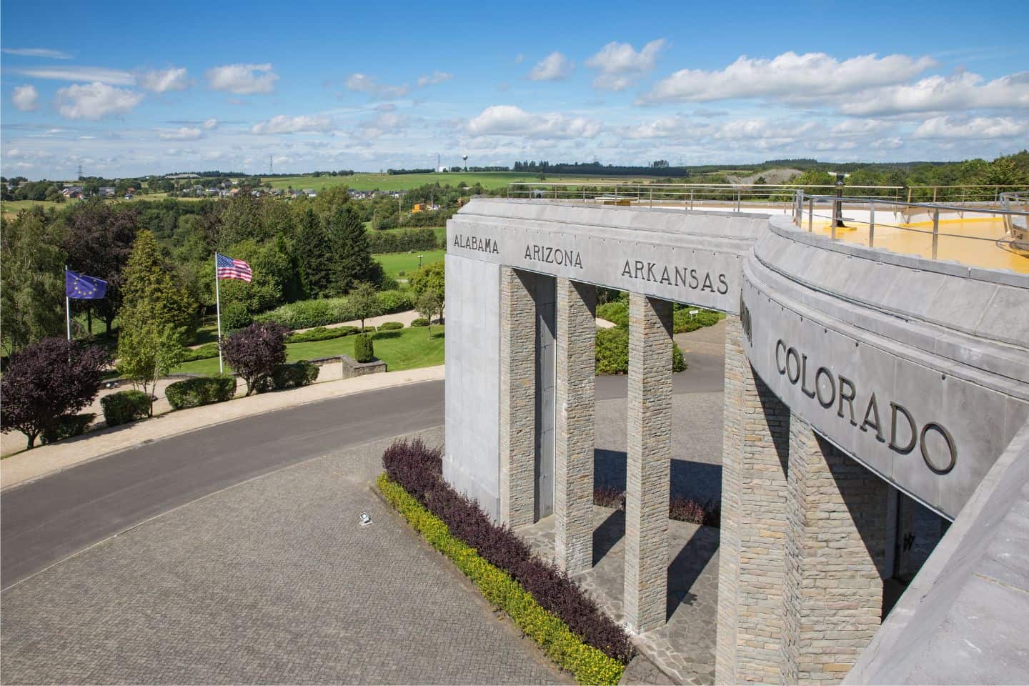 Birdseye view of a stone memorial and the surrounding fields