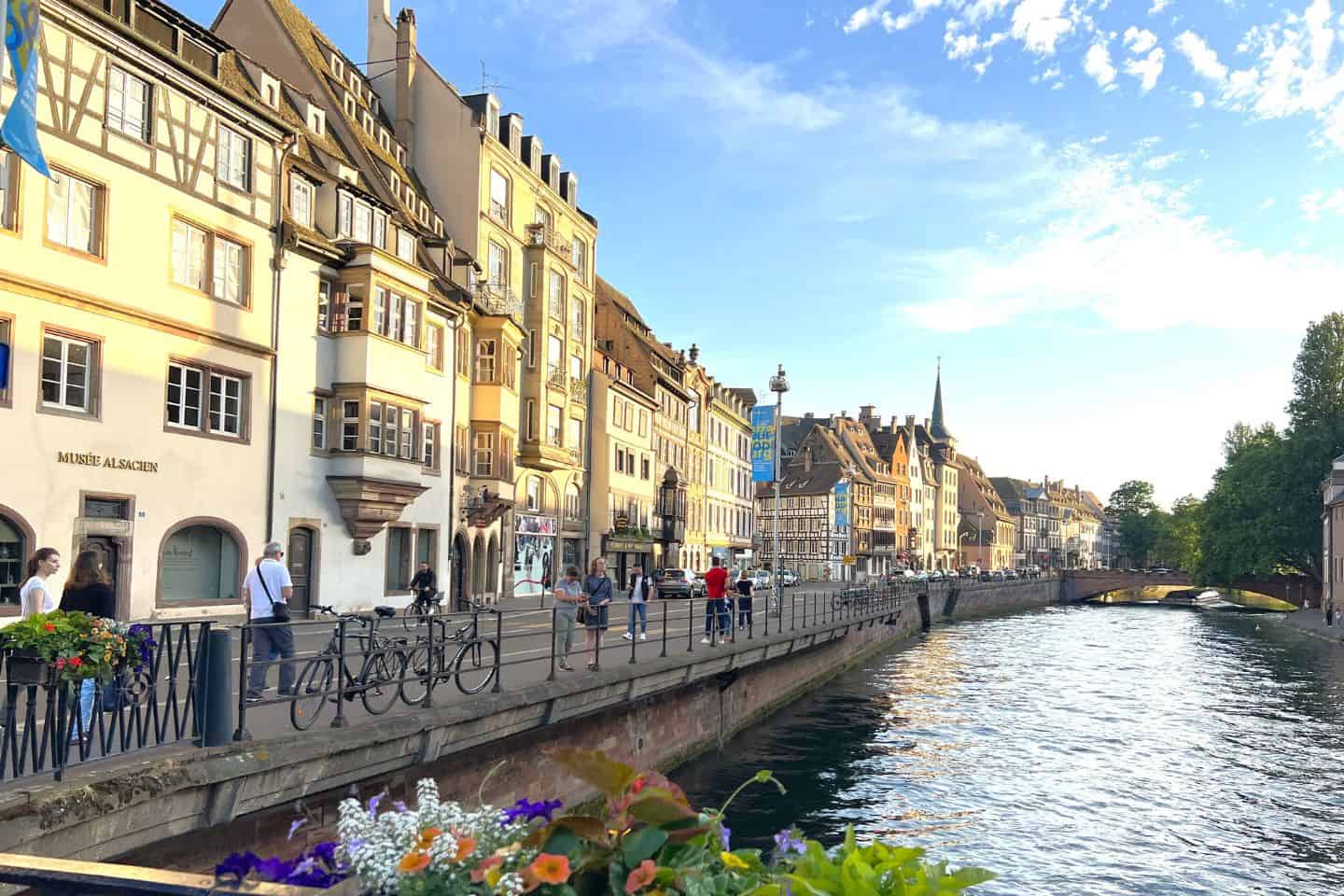Colorful buildings lining a canal in Strasbourg