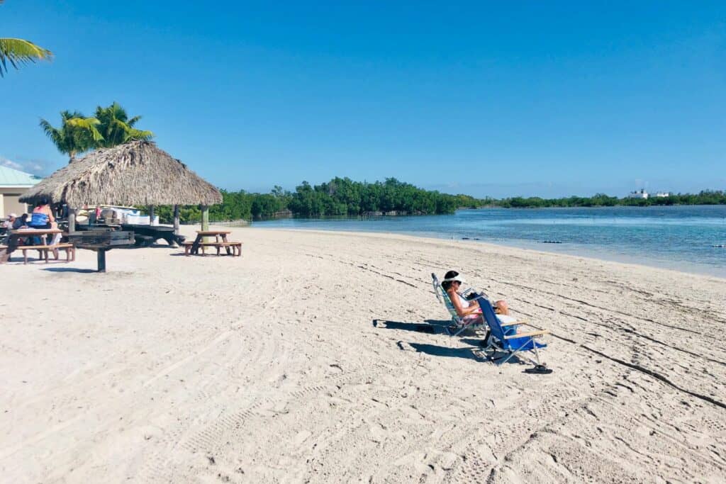 A person sitting on a beach chair