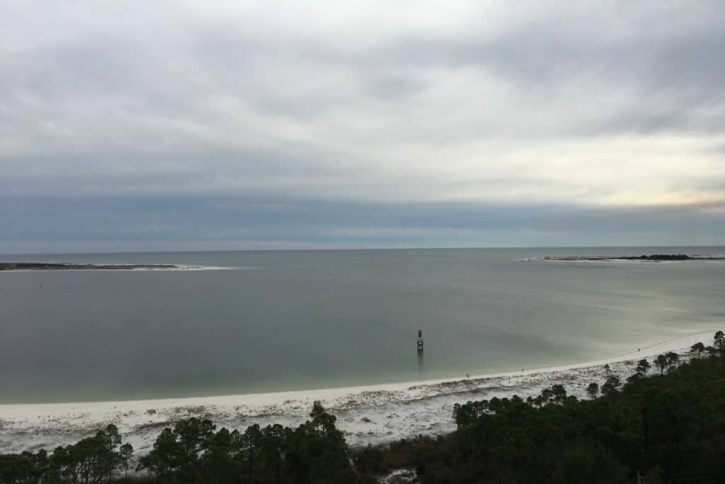 a strech of sandy beach viewed from above