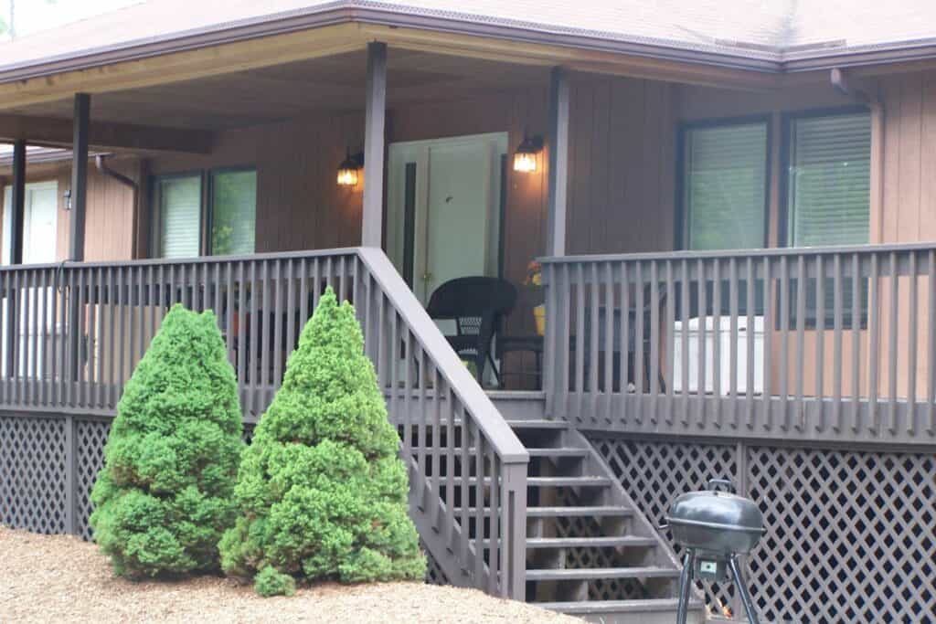 A cabin with a porch