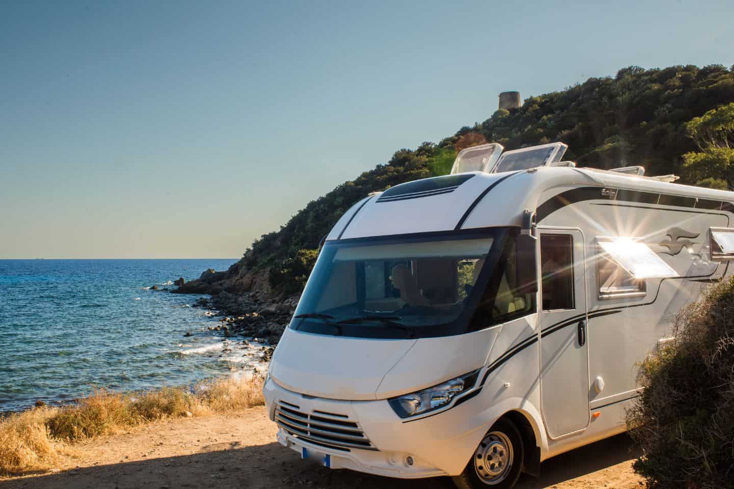 A camper barked next to the ocean