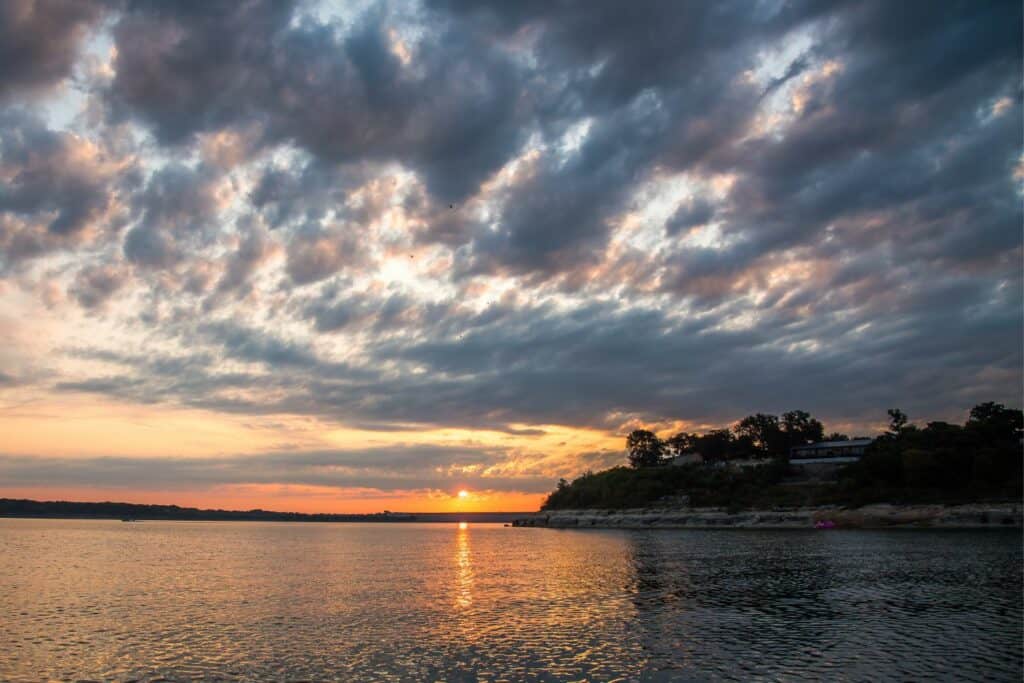 sunrise over a calm lake