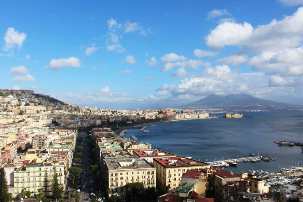 birdeye view of the naples skyline with mt vesuvius in the background