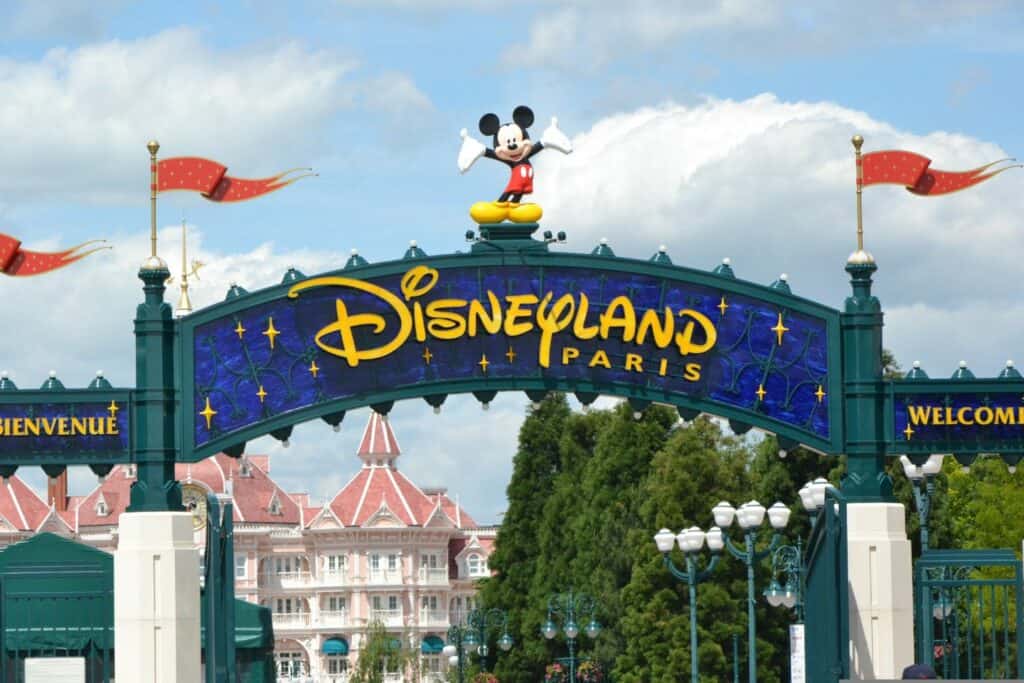 A colorful sign at the entrance to Disneyland Paris