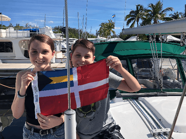 The kids holding a Bahamian flag