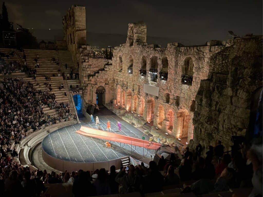 Night view of a performance at an ancient Greek theater