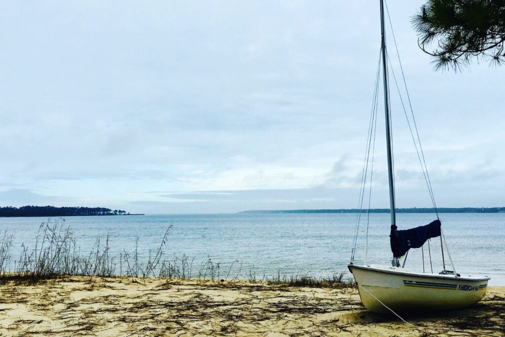 A small sailboat on the beach