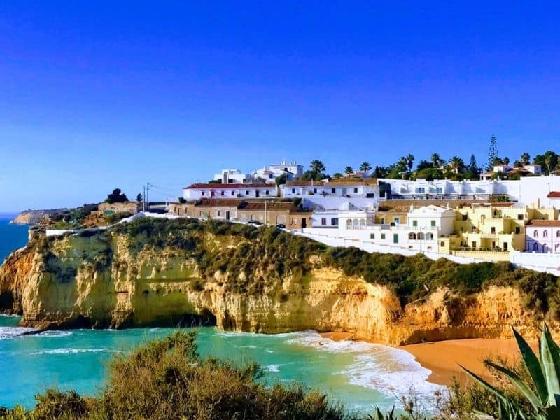 Building on a cliff overlooking the beach