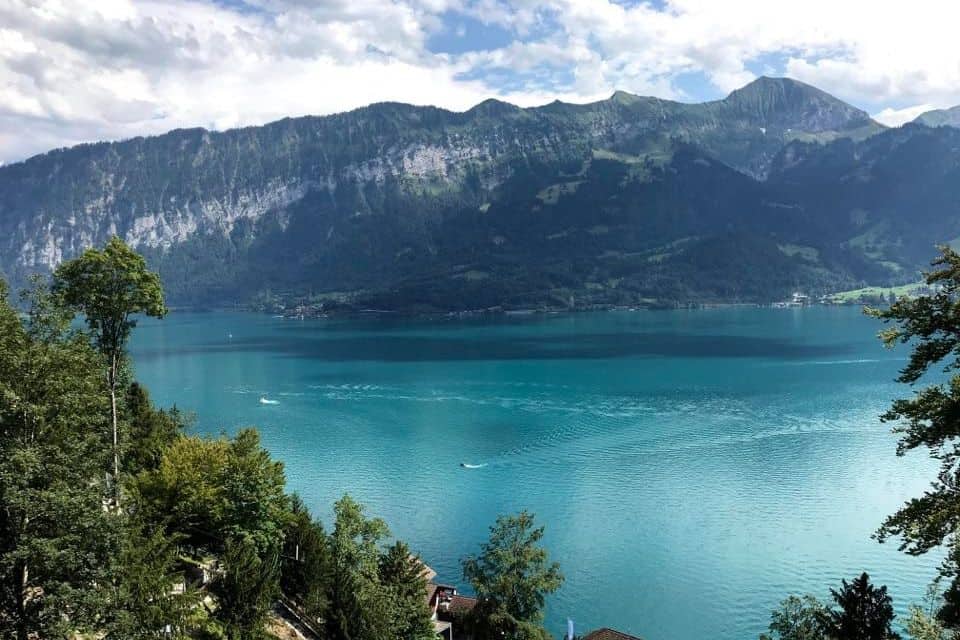 A turquoise lake surrounded by mountains