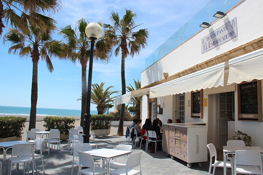 Terrace seating with an ocean view at El Embarcadero restaurant
