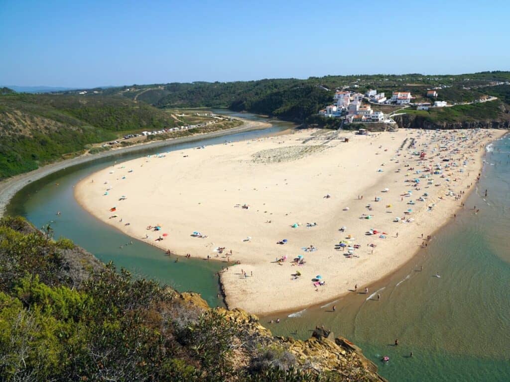 A beach surrounded by water on three sides