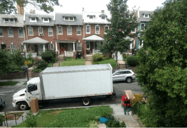 Mover loading a truck. Military retirees are entitled to one year of household goods storage.