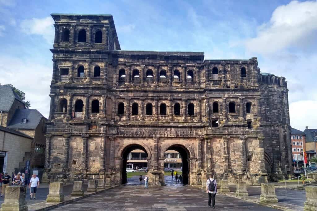 An ancient Roman city gate made of stone