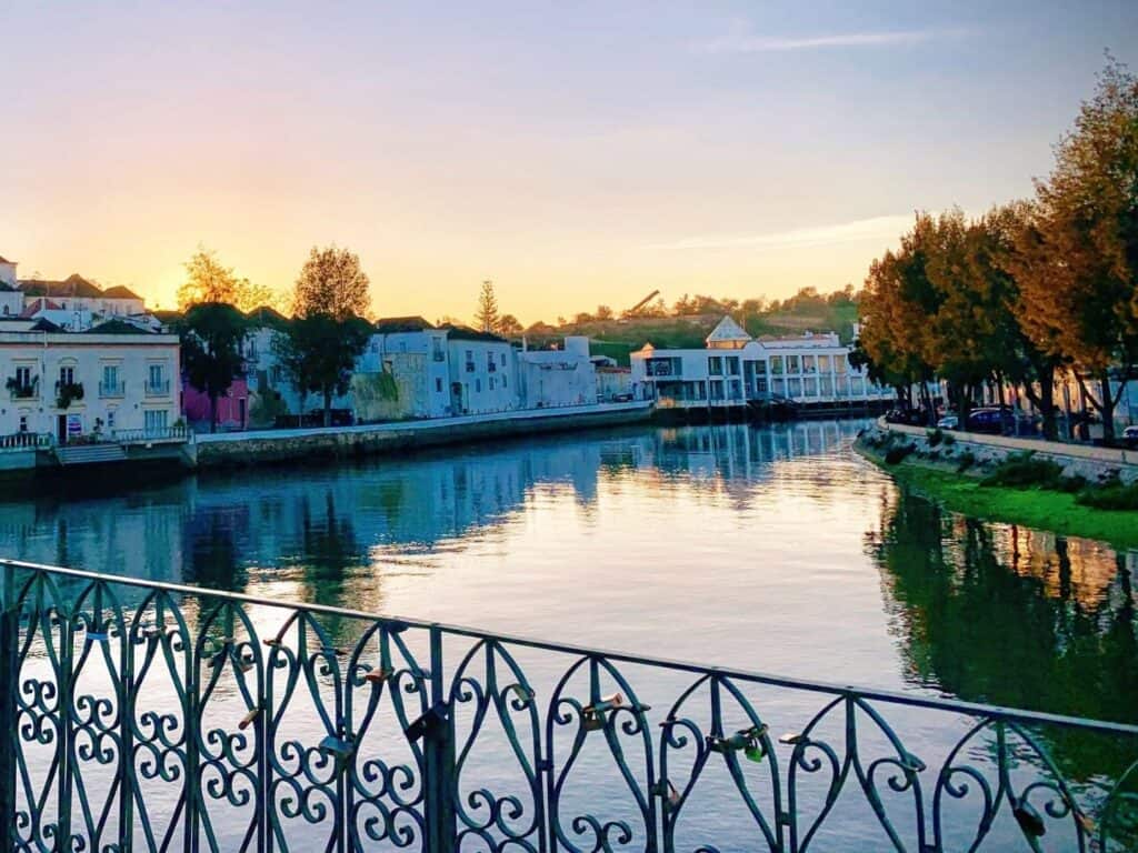 A town on a small river at sunset