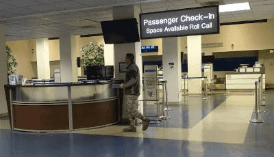 The AMC flight counter for passenger check-in and Space-Available Roll Call at Travis AFB