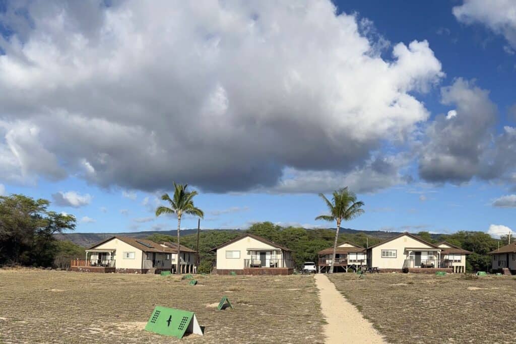 A row of beach cottages with porches