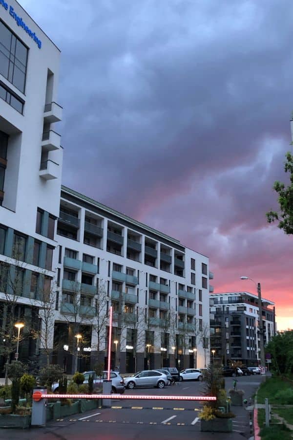 A modern apartment building at dusk