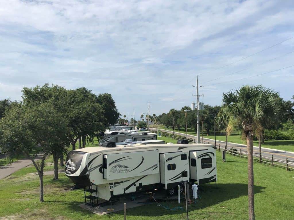 RVs parked along a grassy area